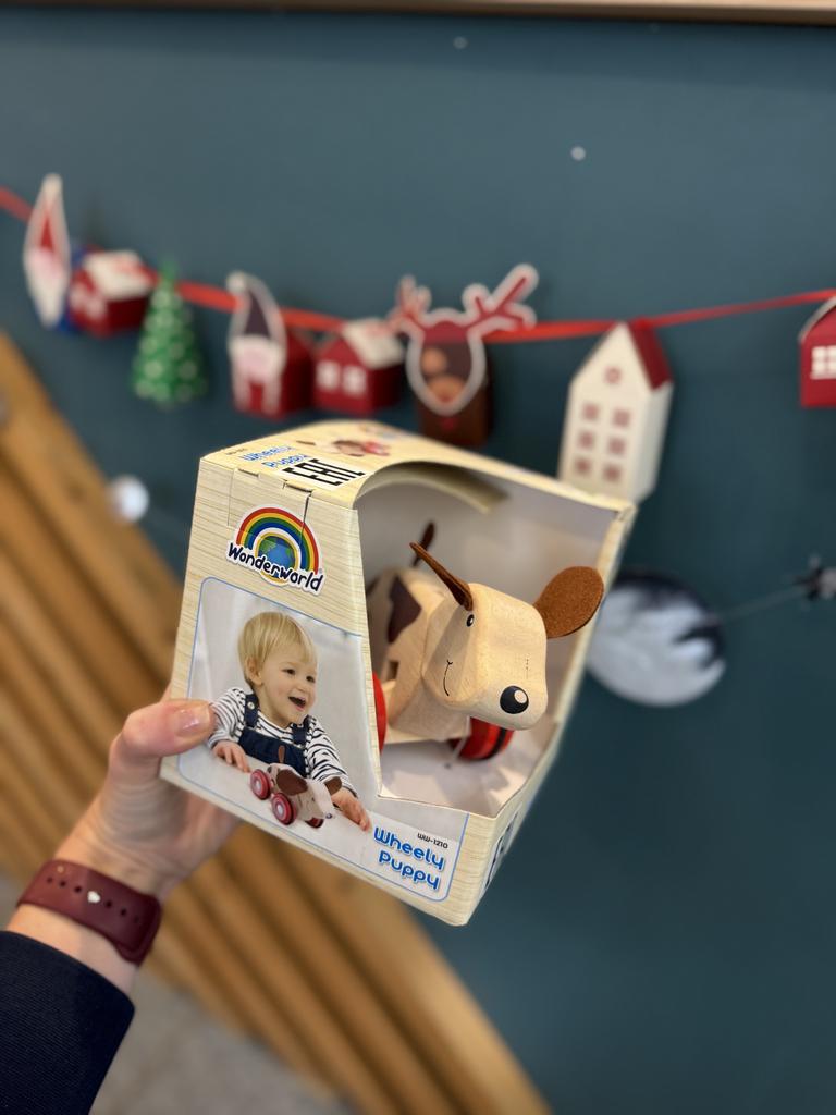 Деревянная игрушка на колесах "Щенок"